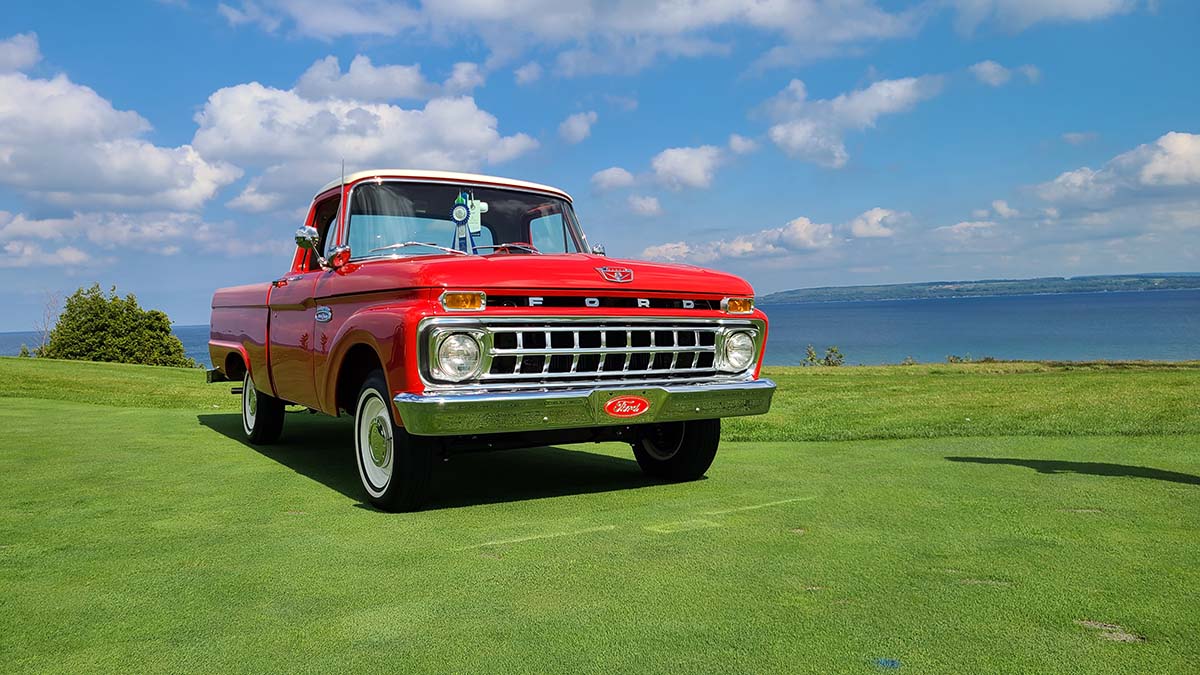 Vintage car on grass in Summer